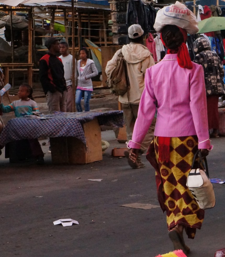 Madagascar woman with bag on head