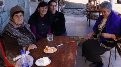 Eating hand-made cheese with Armenian old lady at Goshavank