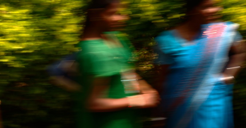 Sri Lanka: Flashing Saris from a train